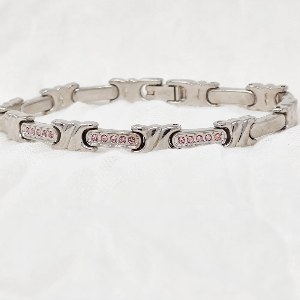 Silver bracelet with tiny pink crystals